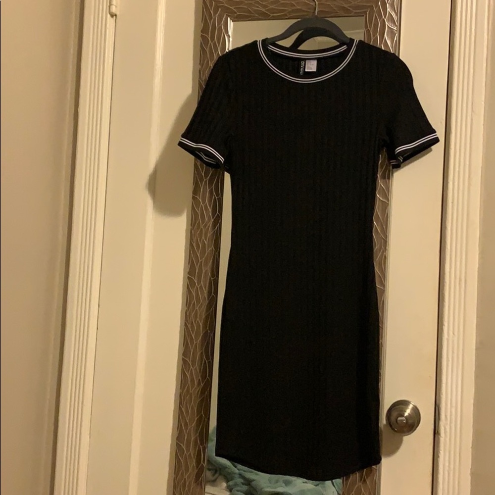 Tight black T-shirt dress